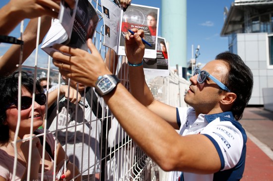 Monte Carlo, Monaco. Friday 22 May 2015. Felipe Massa, Williams F1, signs autographs for fans. Photo: Glenn Dunbar/Williams ref: Digital Image _89P9394