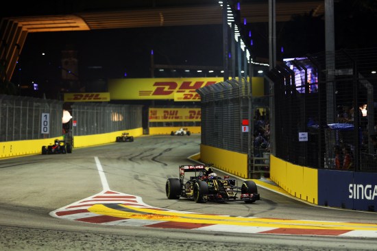 Romain Grosjean (FRA) Lotus F1 E23 pulls into the pits. Singapore Grand Prix, Sunday 20th September 2015. Marina Bay Street Circuit, Singapore.