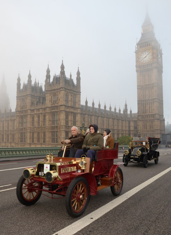 Drivers cross Westminster Bridge during the Bonhams London to Brighton Veteran Car Run, London. PRESS ASSOCIATION Photo. Picture date: Sunday November 1, 2015. As many as half a million spectators will line the route of the Bonhams London to Brighton Veteran Car Run this November, when the longest running motoring event in the world sets off on its annual adventure from London to Brighton. Photo credit should read: Anthony Devlin/PA Wire