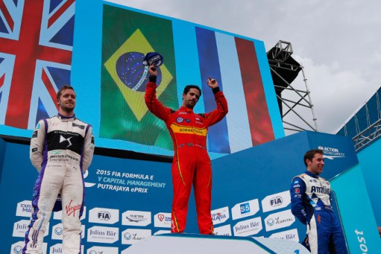 Brazil's Lucas Di Grassi (ABT Audi Sport FE01) celebrates on the podium with Sam Bird (DS Virgin Racing DSV-01) and Robin Frijns (Andretti - Spark SRT_01E). Photo: Zak Mauger/LAT