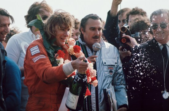 1974 BRDC International Trophy.  Silverstone, England. 7th April 1974.  James Hunt, Hesketh, 1st position, on the podium.  Ref: 74IT02. World Copyright: LAT Photographic